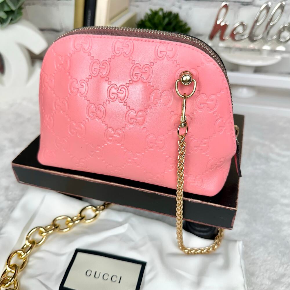 Gucci pink guccissima leather cosmetic clutch or wear as crossbody!